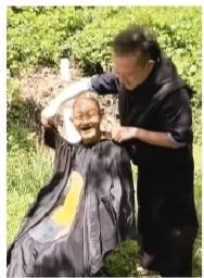 剪刀剪掉了老人的心理负担 也剪出了人间的温情
